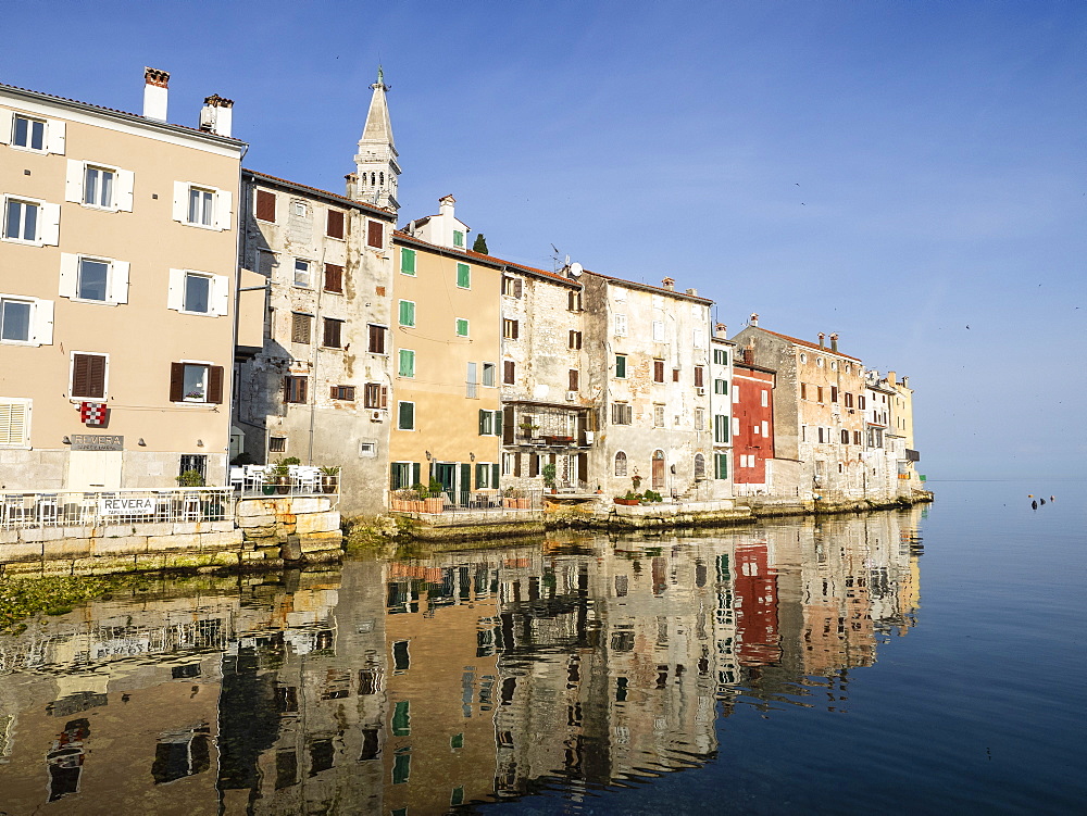 The Old Town with reflections early morning, Rovinj, Istria, Croatia, Europe