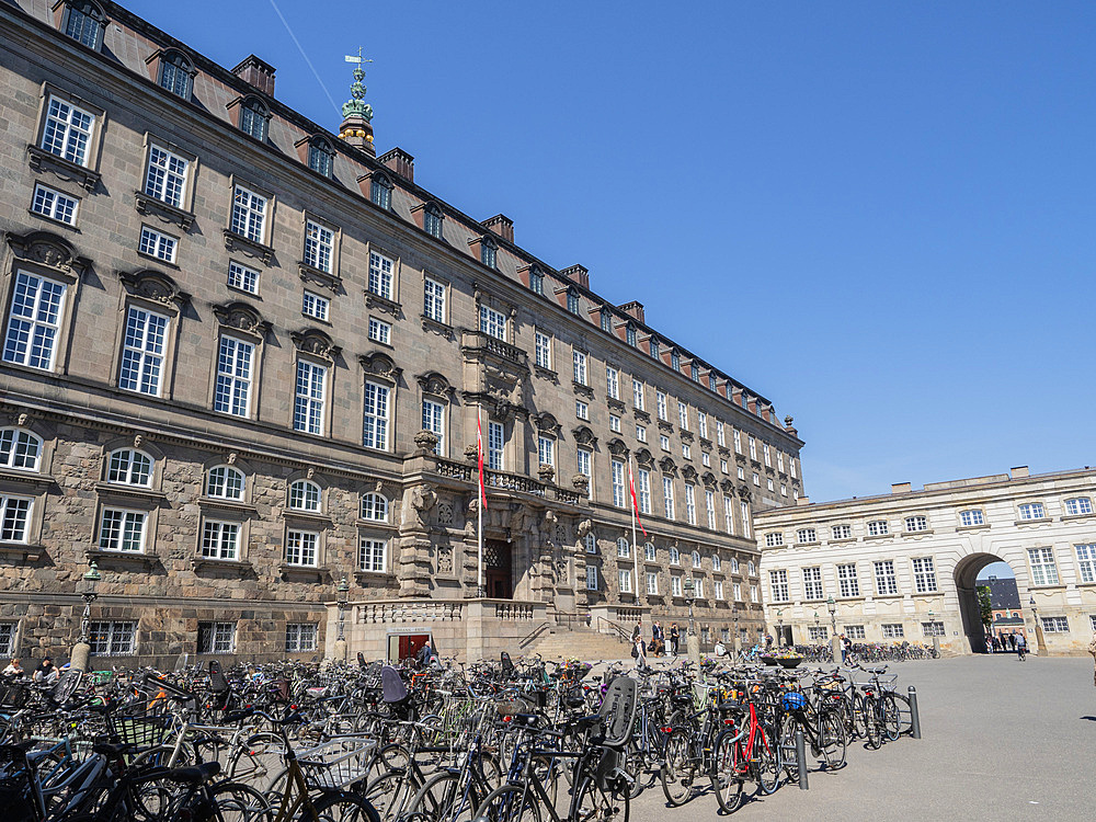 Rows of bicycles outside the Christiansborgs Palace, home of the Danish Parliament, Copenhagen, Denmark, Scandinavia, Europe