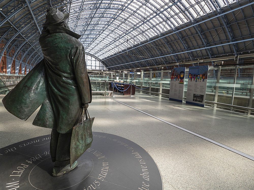 Sculpture of Sir John Betjeman inside St Pancras International railway station, London, England