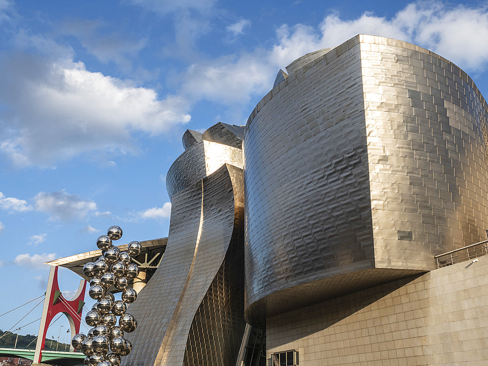 'Tall Tree and the Eye', a sculpture by Anish Kapoor, outside the Guggenheim Museum, with Red Arches in the background, Bilbao, Basque Country, Spain, Europe