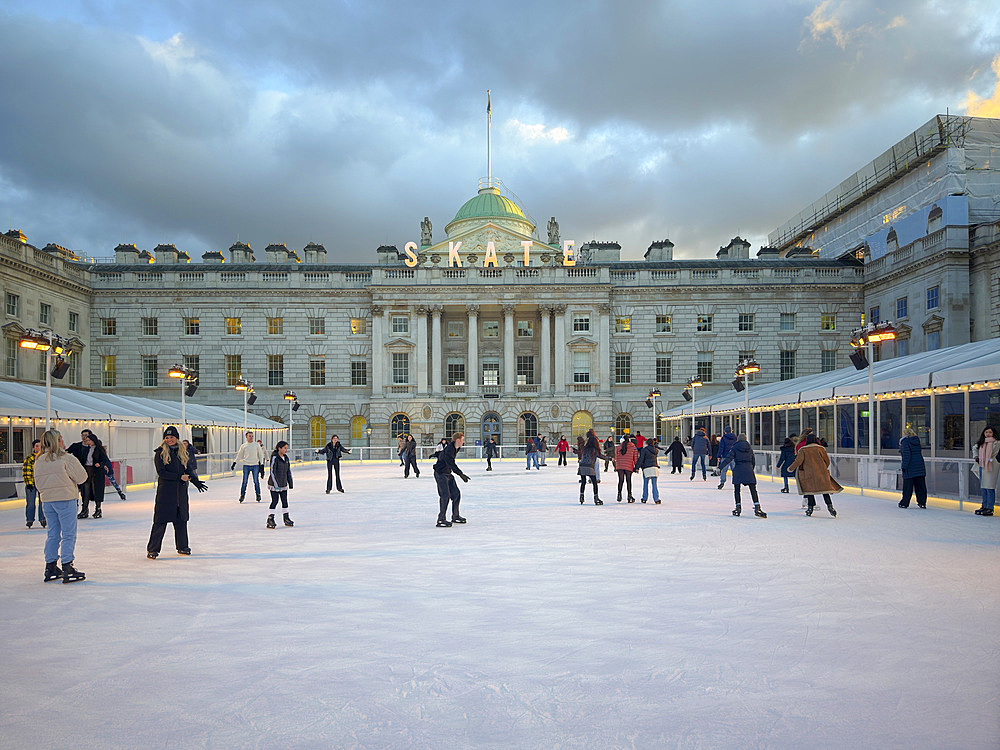 Ice Rink with skaters, Somerset House, London, England, UK