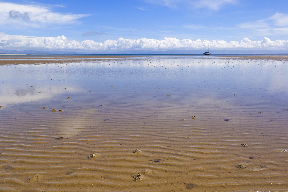 Reflections in the tidal seawater pools of the long sweeping beach of Llanbedrog, Llyn Peninsula, Gwynedd, North Wales, Wales, United Kingdom, Europe