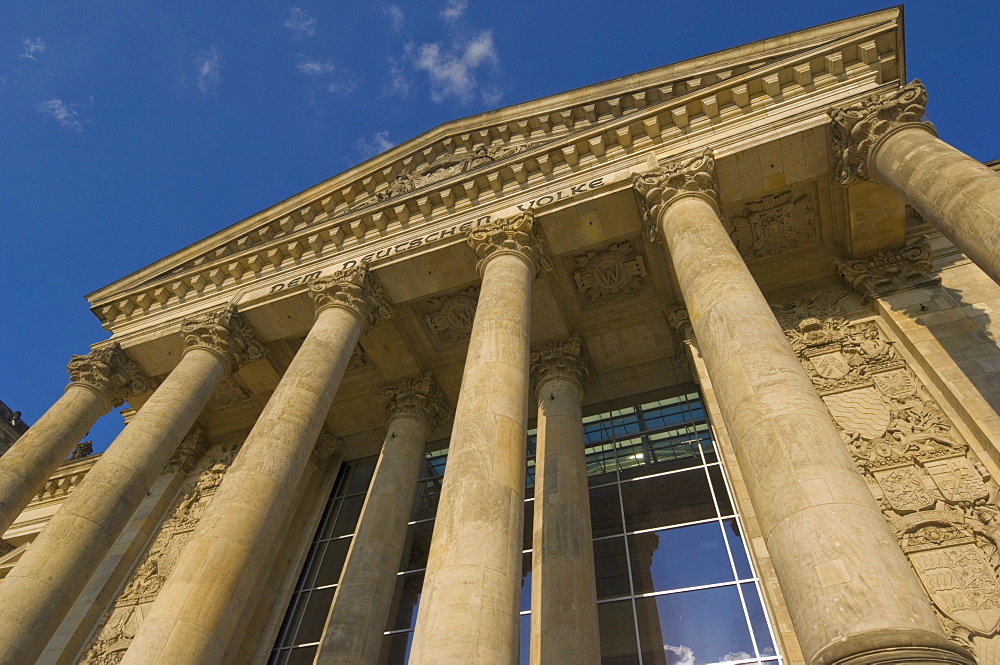 Facade and columns of the Reichstag parliament building bearing the dedication Dem Deutschen Volke (To the German People) reconstructed by Sir Norman Foster between 1994 and 1999, Berlin, Germany, Europe