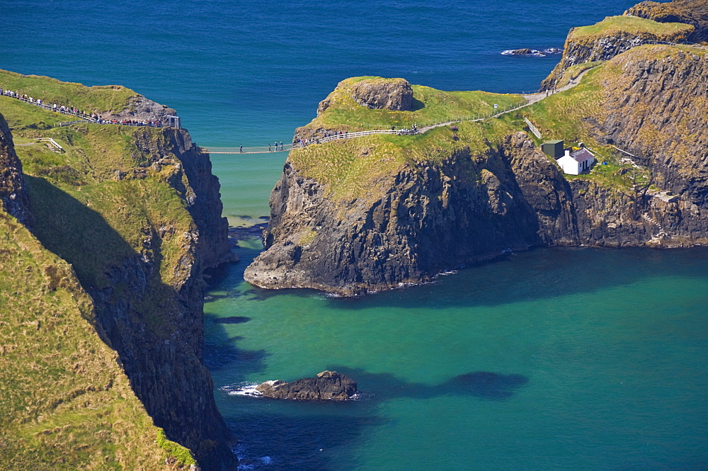 Carrick-a-Rede rope bridge to Carrick Island, Larrybane Bay, Ballintoy, Ballycastle, County Antrim, Ulster, Northern Ireland, United Kingdom, Europe