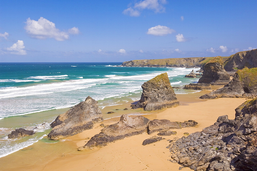 Rock stacks, beach and rugged coastline at Bedruthan Steps, North Cornwall, England, United Kingdom, Europe