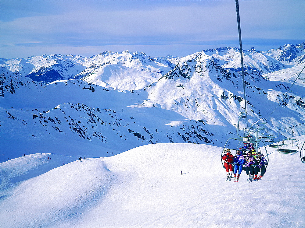 France, Alps, Savoie, Val Thorens In Winter, Chairlift, Ski Runs & Mountains At Back