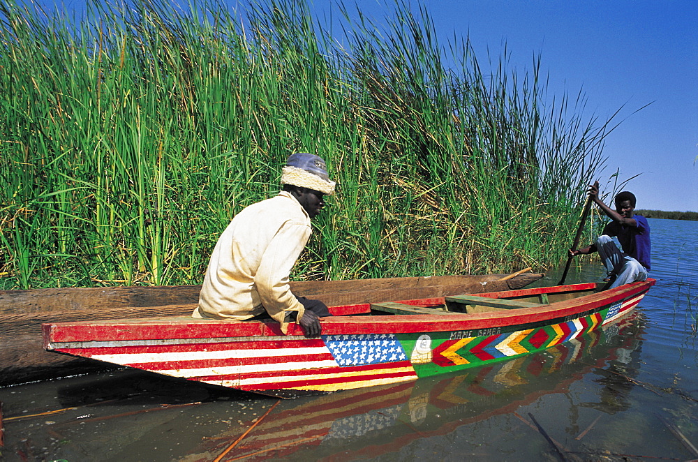 Senegal, Fleuve Province, Near St Louis The Djouj National Reserve, Fishermen On An Outrigger, 