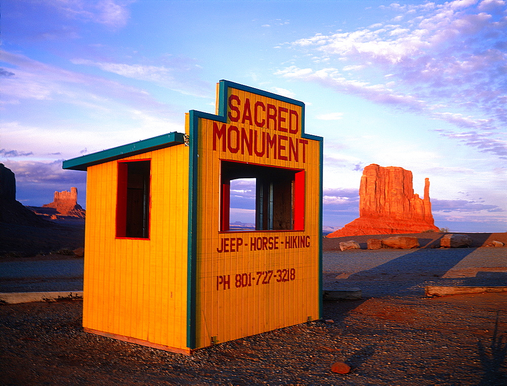 Usa, South West, Arizona & Utah, Navajo Reservation Of Monument Valley, Red Rocks Peaks (Mesas) At Dusk, Hut At Fore