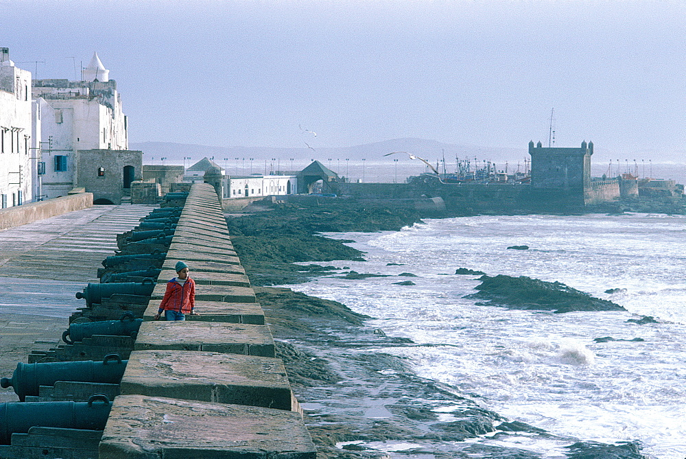 Morocco, Essaouira, Ancient Fortified Portuguese City, The Ramparts Overlooking The Atlantic Ocean, Donjon And Fishing Harbour In Background