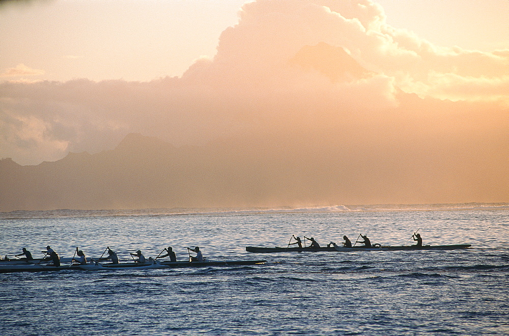 French Polynesia, Windward Islands, Tahiti, Outriggers Passing By At Dusk, Moorea Lagoon At Back