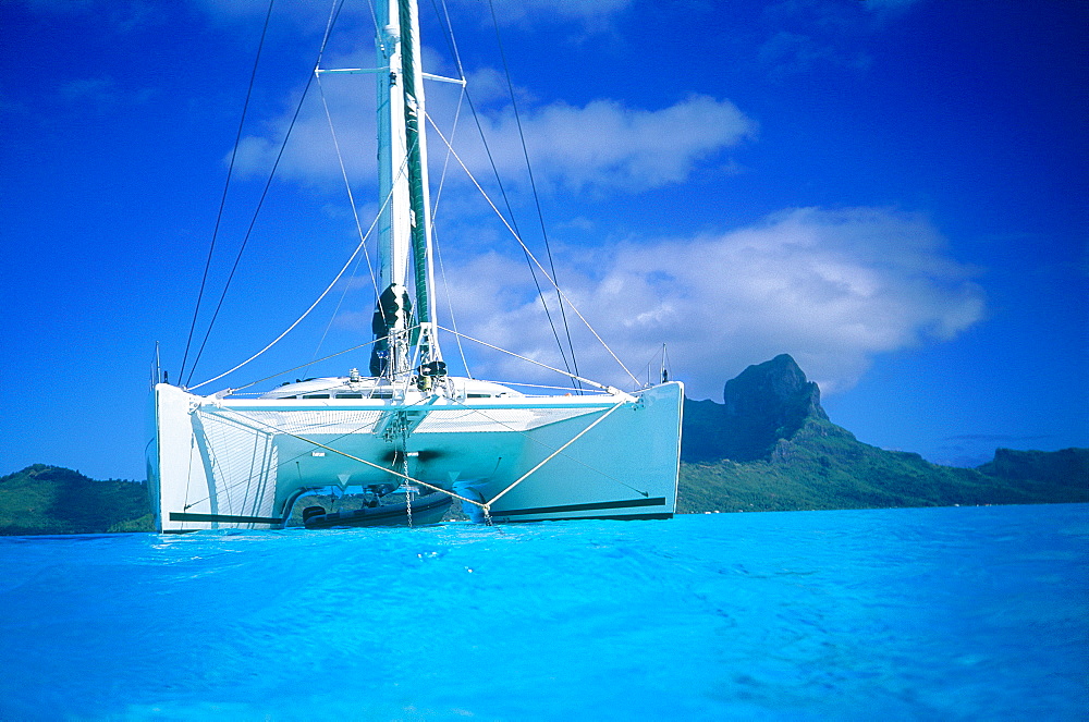 French Polynesia, Leeward Islands, Borabora, Landscape Of The Lagoon With A Catamaran Moored 