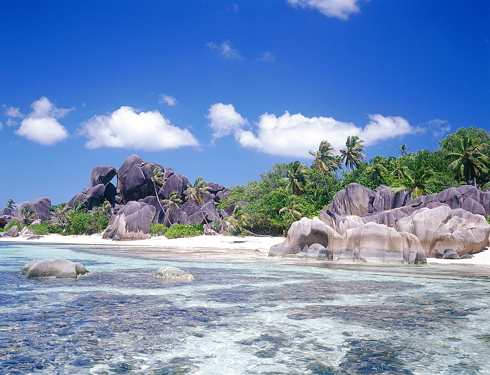 Seychelles, La Digue Island, Source D'argent (Silverspring) Beach Characterized By Huge Basaltic Rocks And Turquoise Lagoon