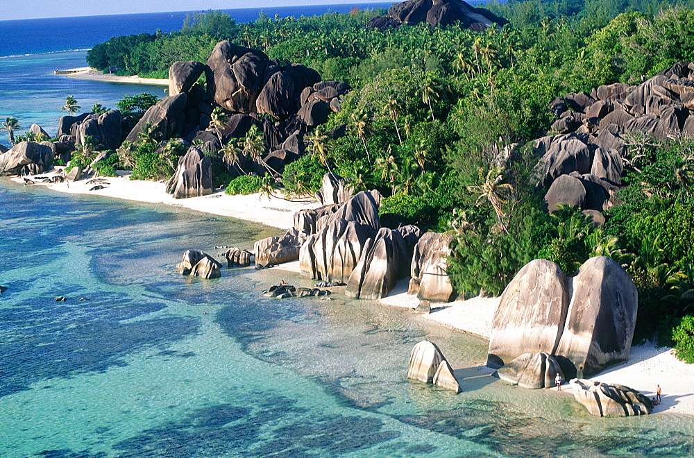 Seychelles, La Digue Island, Aerial Of Source D'argent (Silverspring) Beach Characterized By Huge Basaltic Rocks And Turquoise Lagoon