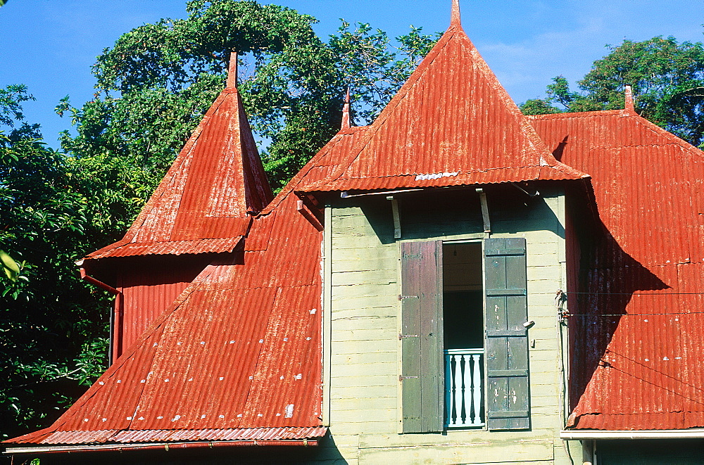 Seychelles, Mahe, Colonial Style Wooden House With Red Sheetmetal Roof