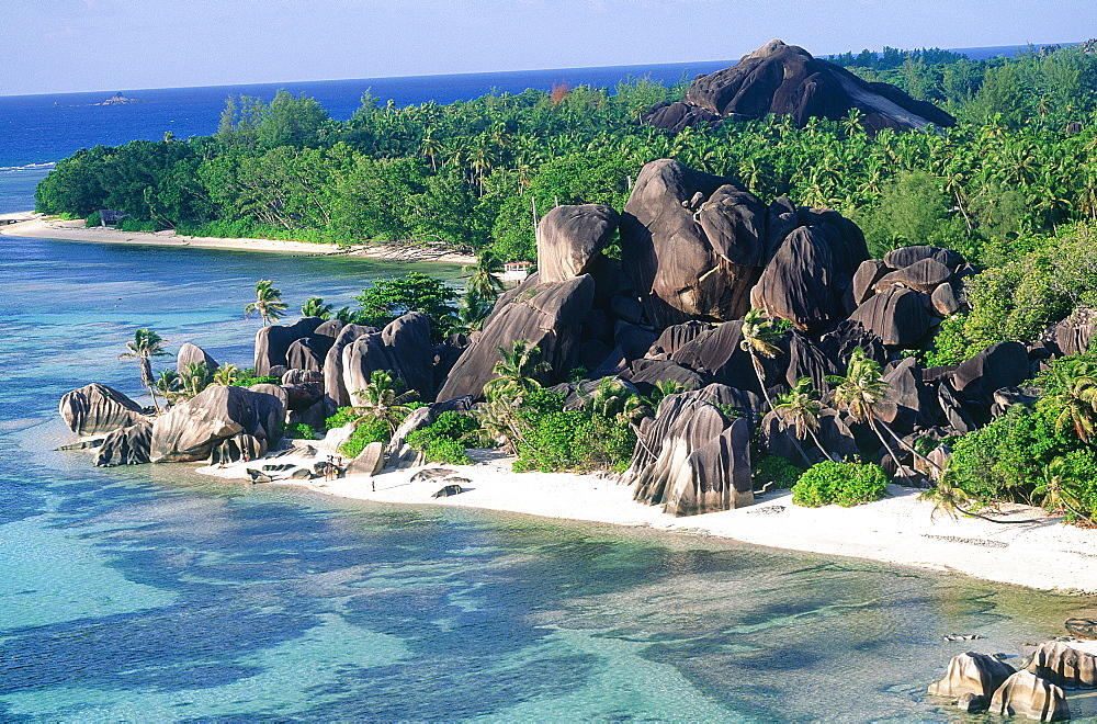 Seychelles, La Digue Island, Aerial Of Source D'argent (Silverspring) Beach Characterized By Huge Basaltic Rocks And Turquoise Lagoon