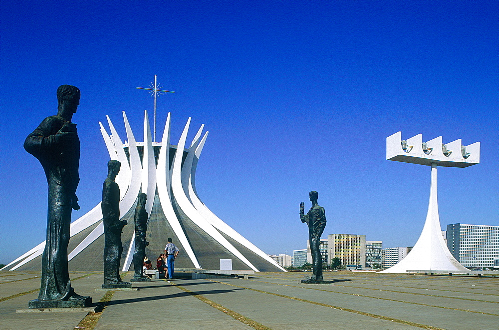 Brazil, Goias, Brasilia, The Administrative Capital Created Par President Kubitschek And Designed By Brasilian Town Planner Lucio Costa & Architect Oscar Niemeyer, The Cathedral And Row Of Statues Lining The Access