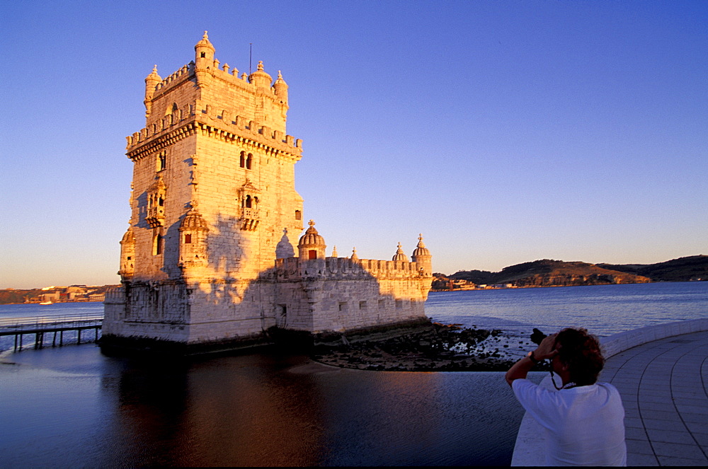 Portugal, Lisbon (Near), Belem, The Stone Tower Built On Tagus River From 1515 To 1525 At Dusk, Tourist Photographing