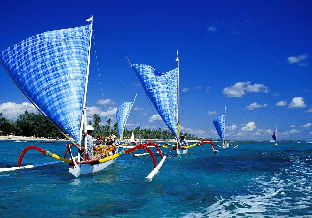 Indonesia, Bali Island, The Nusa Dua Beach, Outriggers Under Blue Sail