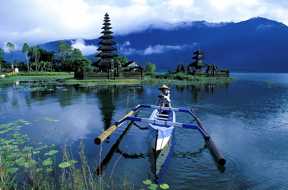 Indonesia, Bali Island, The Lake Bratan Temple And Outrigger At Fore