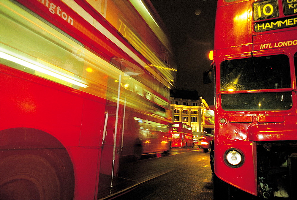 UK, London, Red Buses At Night