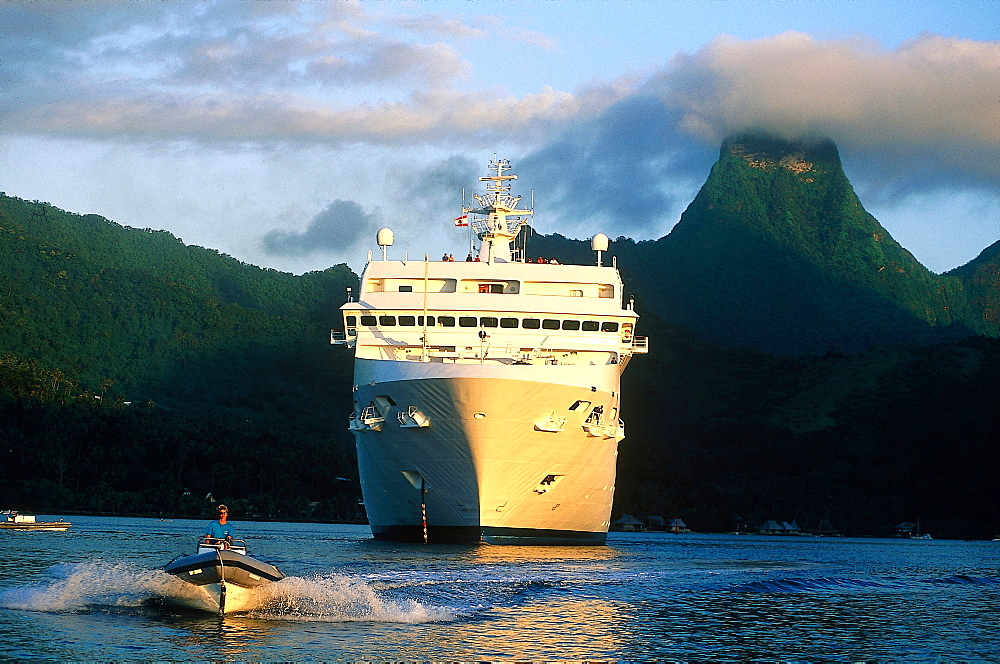 French Polynesia, Gastronomic Cruise On M/S Paul Gauguin, The Ship Leaving Moorea Cooks Bay At Dusk 