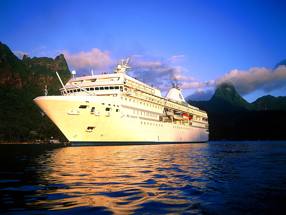 French Polynesia, Gastronomic Cruise On M/S Paul Gauguin, The Ship At Dusk In Moorea Bay Of Cook 