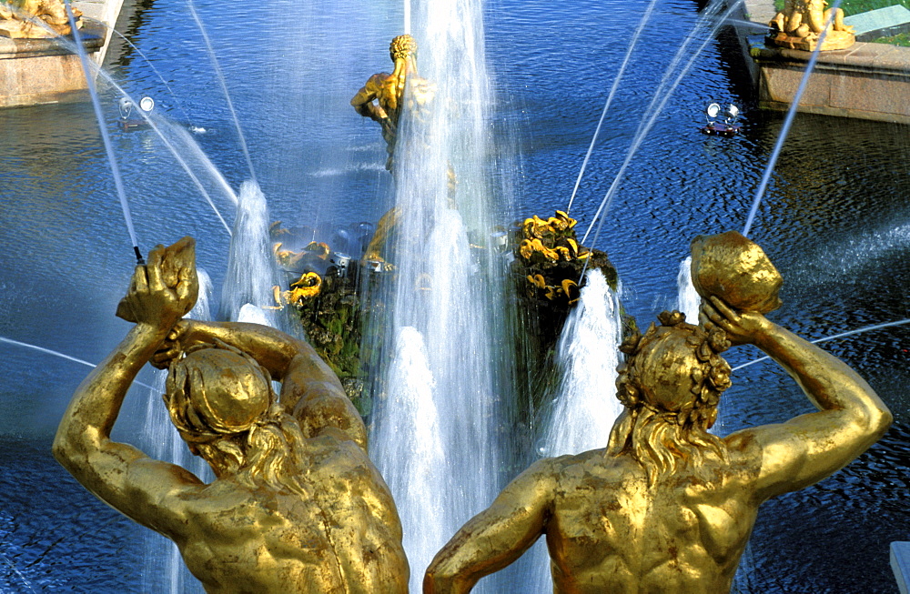 Russia, Saint Petersburg, Peterhof (Petrovorets) Castle And Park, Waterworks Golden Statues At Fore 