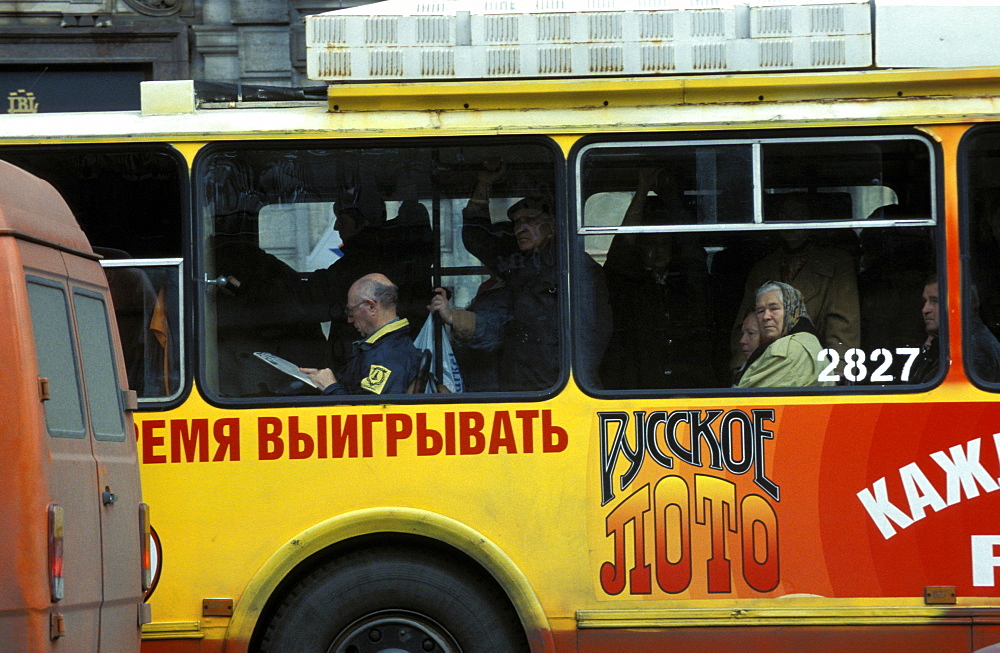 Russia, Saint Petersburg, Newsky Prospekt, Colored Ad On A Bus 