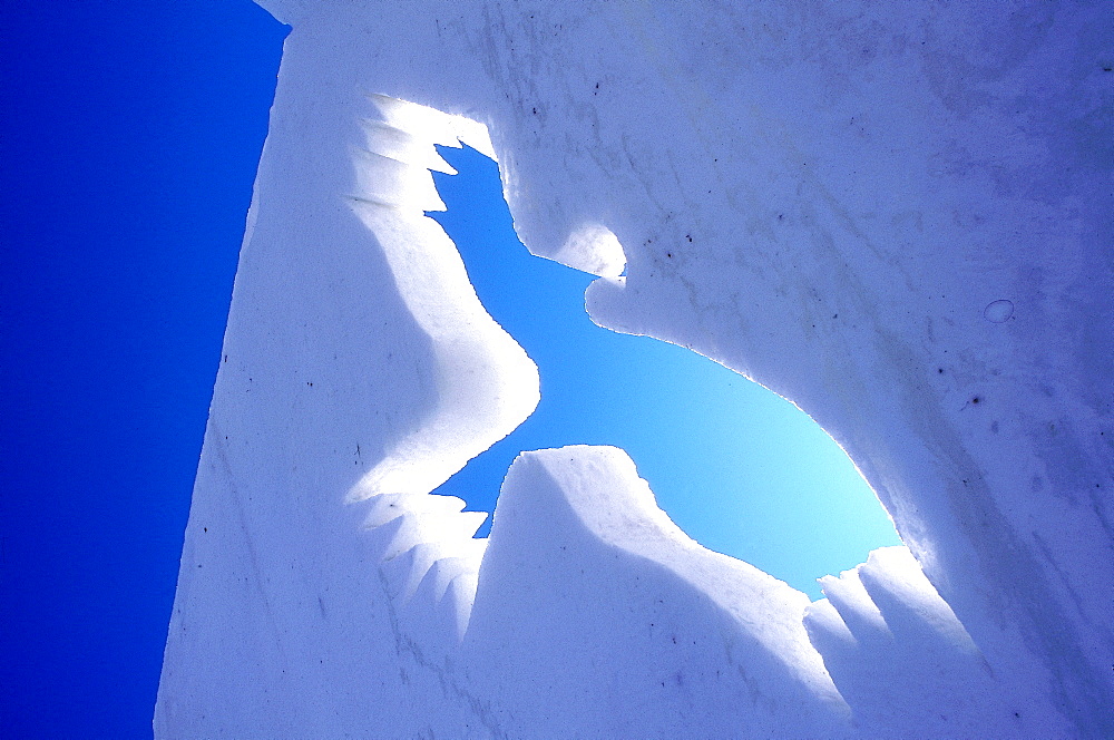 France, Alps In Winter, Savoie, Valloire, Ice Carving Contest, Flying Bird Carved In Snow 