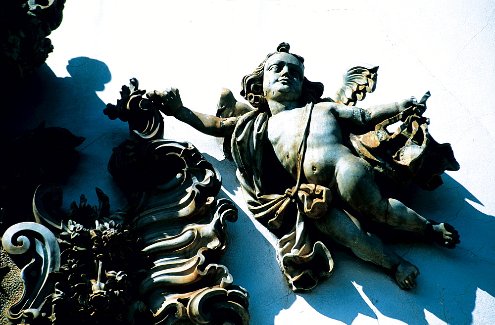 Brazil, Minas Gerais.Ouro Preto Colonial City.Our Lady Of Carmo Baroque Church.Close Up Of A Sculpted Angel On Main Facade