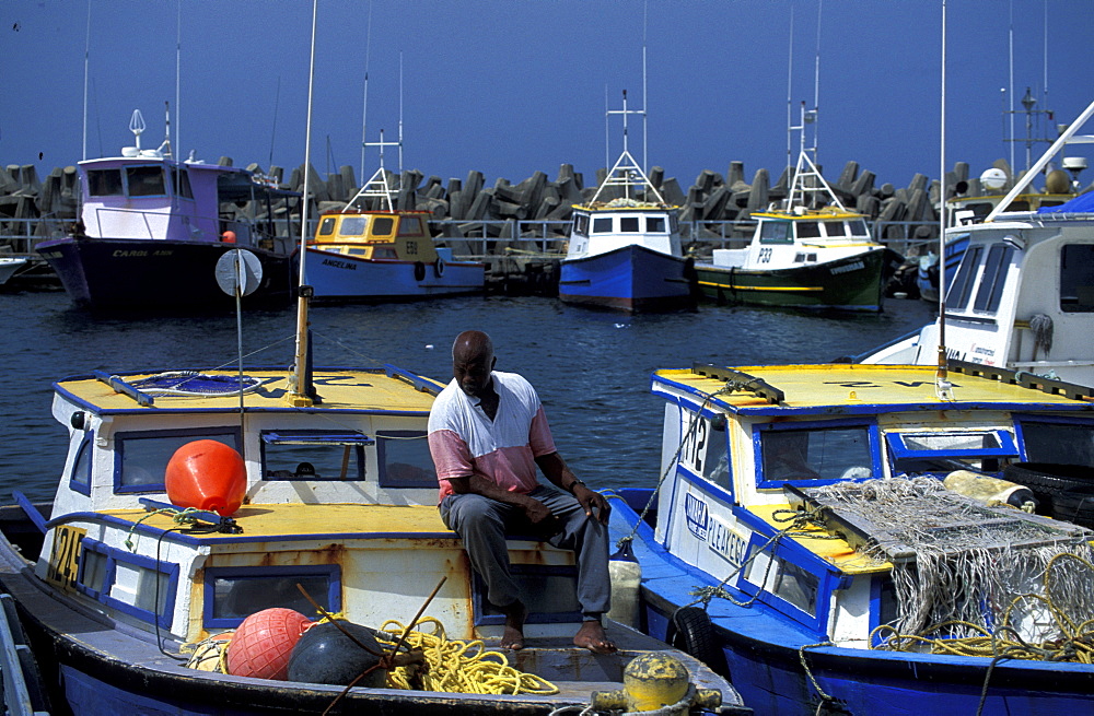 Caribbean, West Indies, Barbados, Bridgetown, Fishermen Harbour, Mr Funmaker Fisherman On His Boats Deck