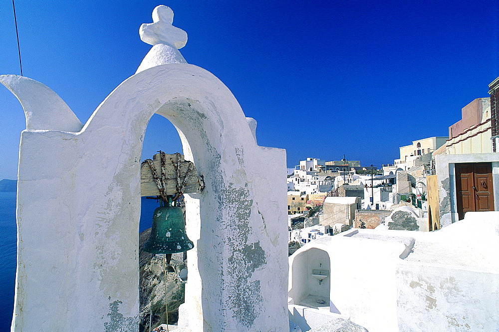 Greece, Cyclades, Santorini Island, White Homes And Plain Belfry At Fore