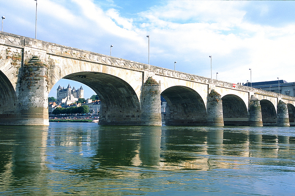 France, Val-De-Loire, Maine-Et-Loire, Saumur, River Loire, Saumur Stone Bridge, Castle Visible Between Arches