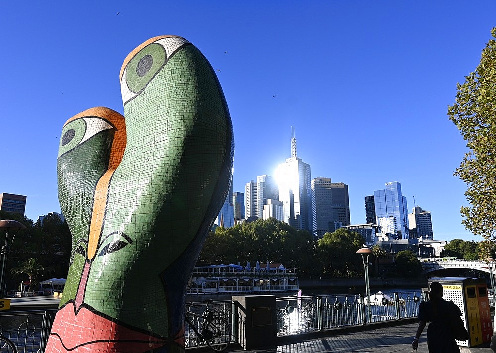 Modern Sculpture and city skyline