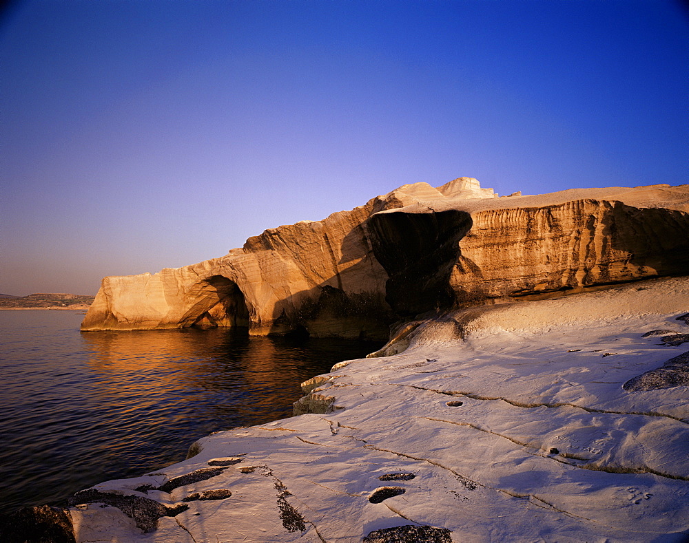 Sarakiniko volcanic rock formations at sunset, island of Milos, Cyclades, Greek Islands, Greece, Europe