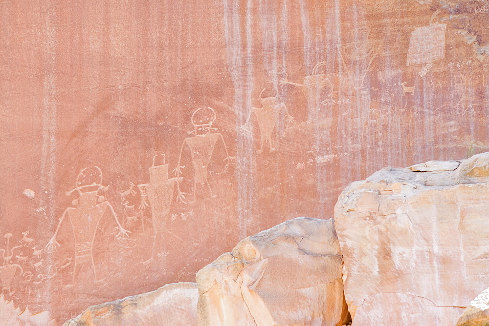 Ancient petroglyphs from the Fremont people on canyon wall, Capitol Reef National Park, Utah, United States of America, North America