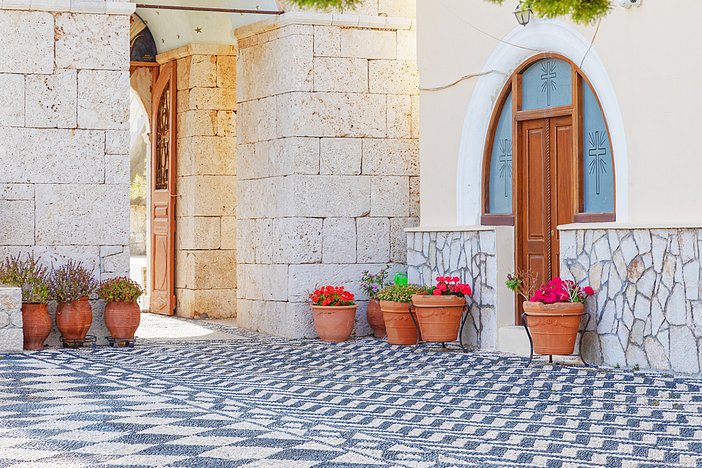 Pavement mosaics outside Saint Nicholas church, Halki Island, Dodecanese Islands, Greek Islands, Greece, Europe