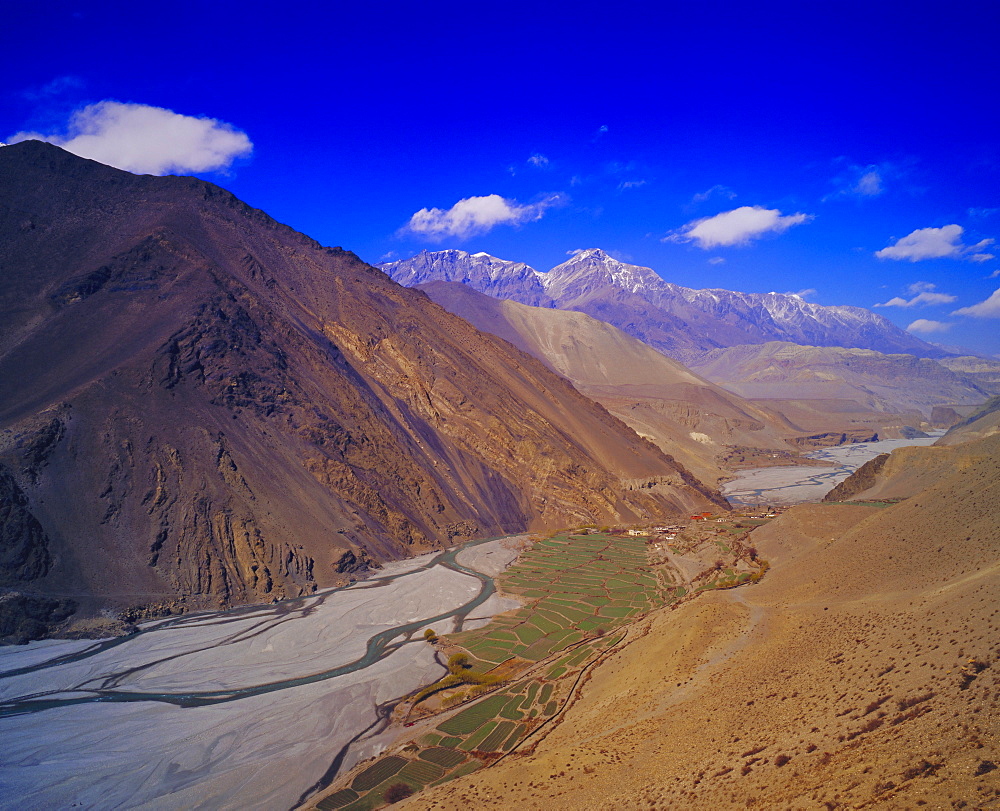 Kangaki River Valley surrounded by mountains, and KaGBeni Village, Southern Mustang, Nepal