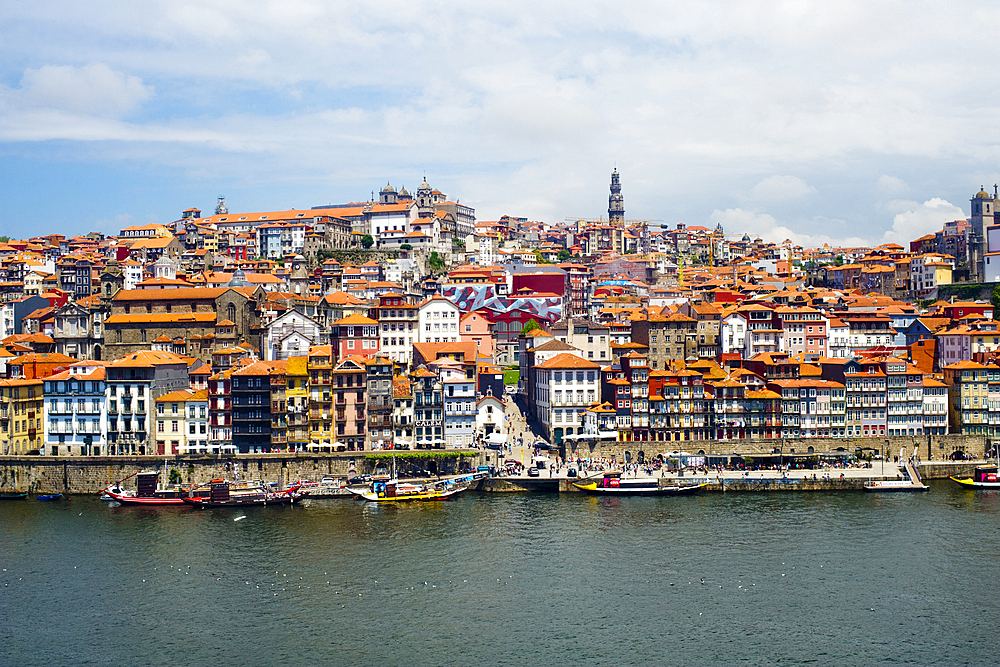 View across the Duoro River towards Porto's historic centre and embankment promenade, UNESCO World Heritage Site, Porto, Norte, Portugal, Europe