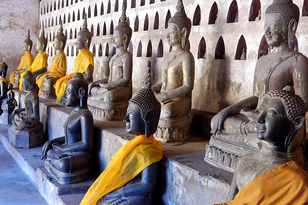 Buddha statues in the cloister or gallery surrounding the sim, Wat Sisaket, Vientiane, Laos, Indochina, Southeast Asia, Asia