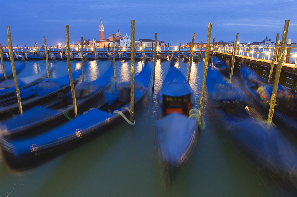 Gondolas on waterfront at night, San Giorgio Maggiore, Venice, UNESCO World Heritage Site, Veneto, Italy, Europe