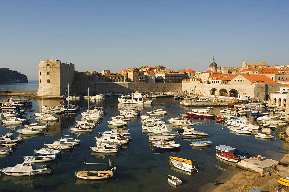 Old Town waterfront harbour area and city walls, Dubrovnik, UNESCO World Heritage, Dalmatia, Croatia, Adriatic, Europe