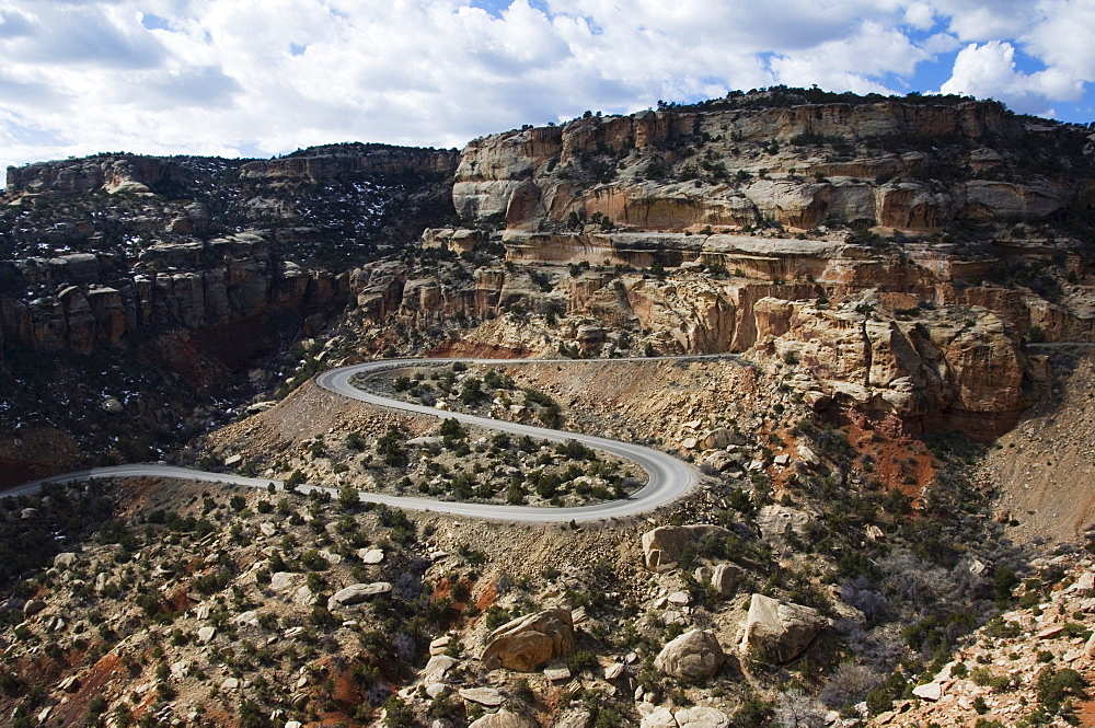 Winding mountain road in plateau and canyon country rising 2000 feet above the Grand Valley of the Colorado River, part of the Great Colorado Plateau, Colorado National Monument, Colorado, United States of America, North America