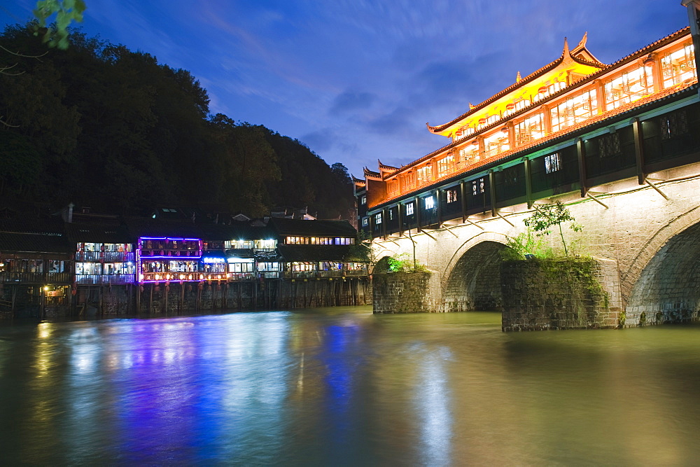 Wind and rain bridge illuminated at night, Fenghuang, Hunan Province, China, Asia