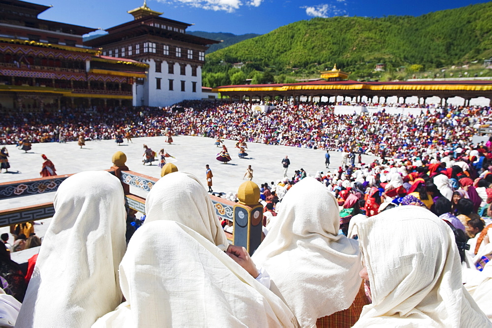 Spectators watching the Autumn Tsechu (festival) at Trashi Chhoe Dzong, Thimpu, Bhutan, Asia