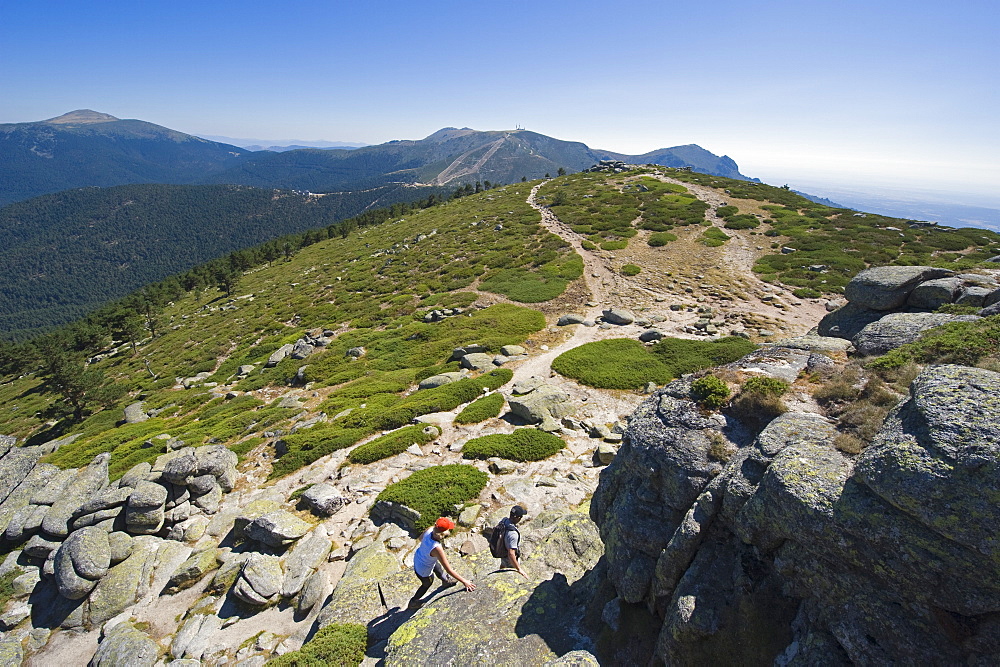 Hikers at Sietos Picos (Seven Peaks), in Guadarrama, Madrid, Spain, Europe