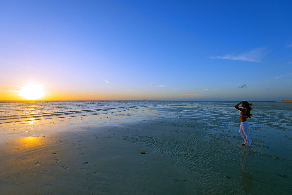 Girl on Sugar Beach at sunrise, Bantayan Island, Cebu, The Visayas, Philippines, Southeast Asia, Asia