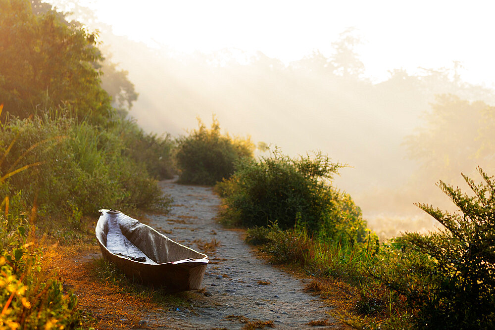 Canoe on a riverbank at dawn, Chitwan National Park, UNESCO World Heritage Site, Nepal, Asia