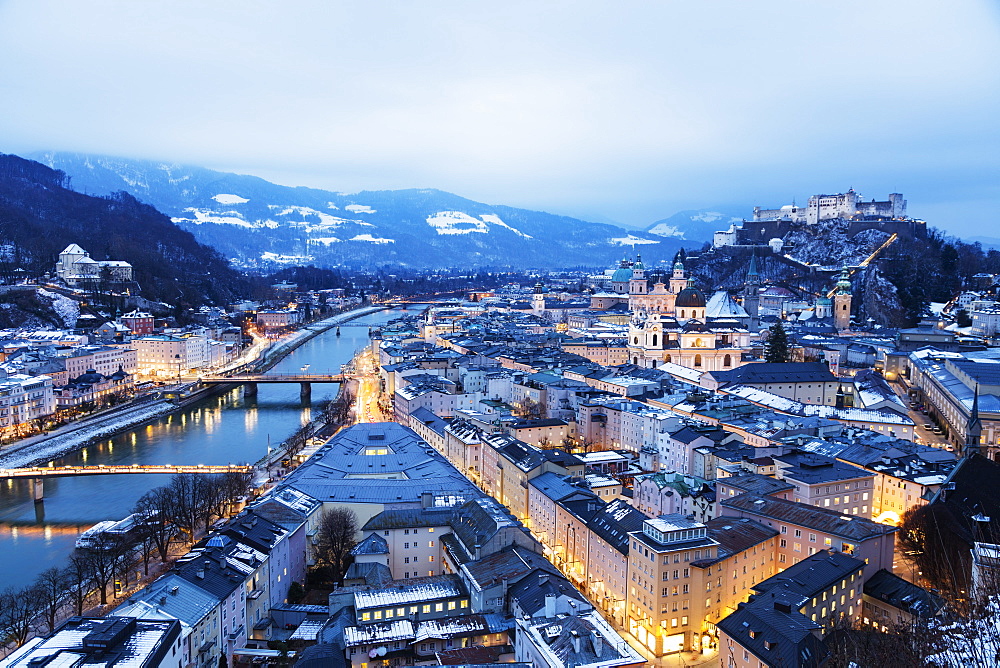 View over the old town, UNESCO World Heritage Site, and Hohensalzburg Castle at dusk, Salzburg, Austria, Europe