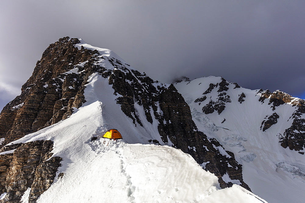 Tent at Camp 4 at 6100m on Peak Korzhenevskaya, 7105m, at sunset, Tajik National Park (Mountains of the Pamirs), UNESCO World Heritage Site, Tajikistan, Central Asia, Asia